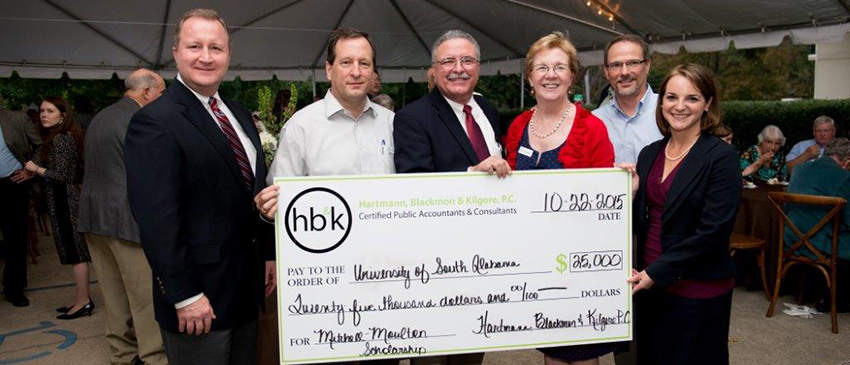 Left to Right the photo shows: Accounting Assistant Professor, Dr. Greg Prescott, USA alumni and shareholders: Earl Blackmon, Vance Kilgore, Sally Wagner, and Dennis Sherrin, and Angela Dunn